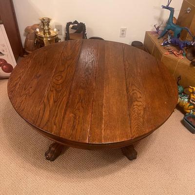 Hand Carved Pedestal Round Table with Lion's Paw Feet