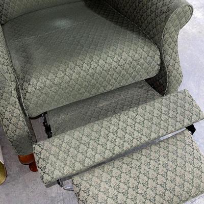 Green diamond pattern wing back reclining chair