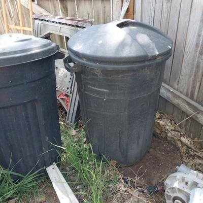 TWO TRASHCANS WITH LIDS