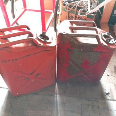 TWO VINTAGE METAL RED CANS