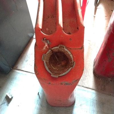 TWO VINTAGE METAL RED CANS