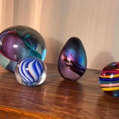 Lot of 4 signed glass paperweights