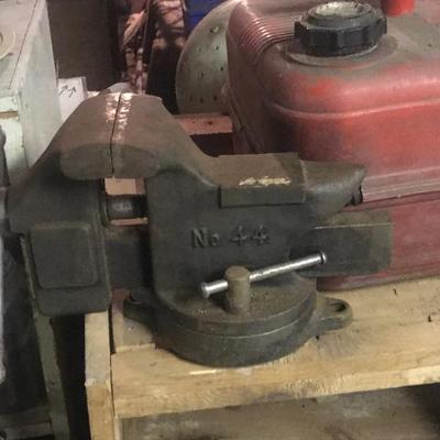 Vises, tools, drill bits, chisels fill a bag 