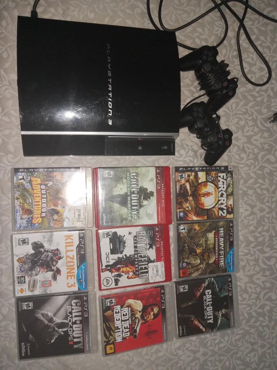 PS3 system with 10 games | EstateSales.org