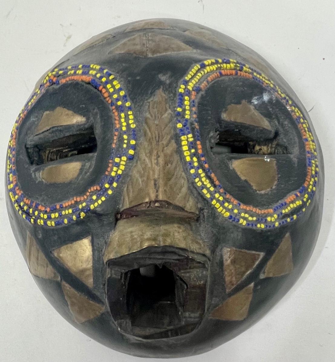 Primitive Carved Wooden Mask - Hand-painted | EstateSales.org
