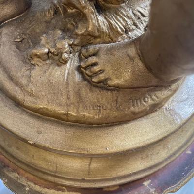 Large Gilt Coated Cherubs on a Stand