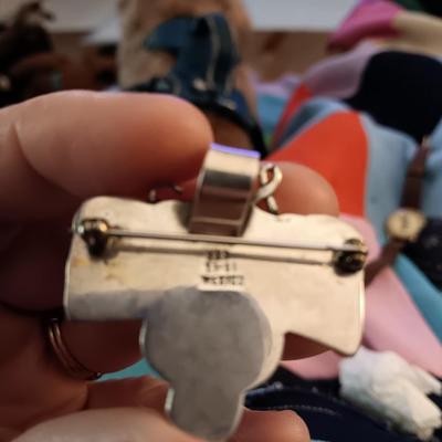 Silver pin