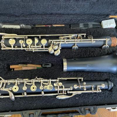 Oboe, Metal Music Stand, and Music Books