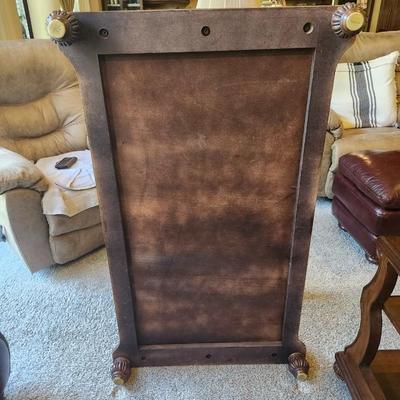 Brown furniture coffee table and two end tables.