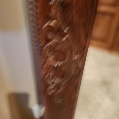 Vintage door that's been turned into a hall mirror