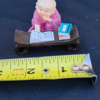 4 vtg MINIATURE ORIENTAL STATUES OF BUDDIST MONK CHILDren playing RESIN