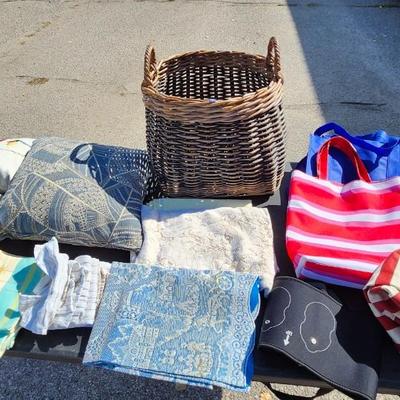 Basket, pillow and linens
