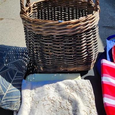 Basket, pillow and linens