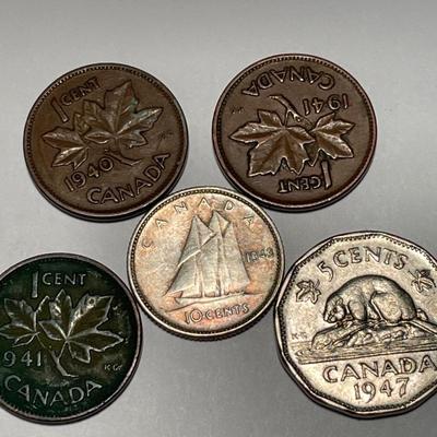 Sale Photo Thumbnail #181: See pics. Pennies: two 1941, 1940. Dime 1948. Nickel 1947