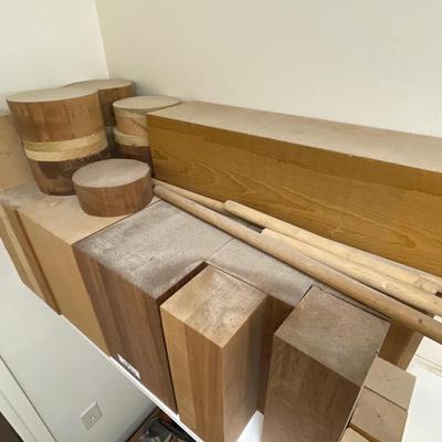 Shelf of various hardwood pieces