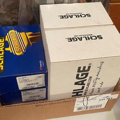 4 boxes of Schlage Door Handles/Locks - 2 look new in Blue Boxes