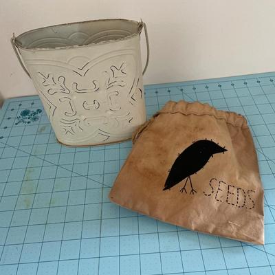 Metal planter and seed bag