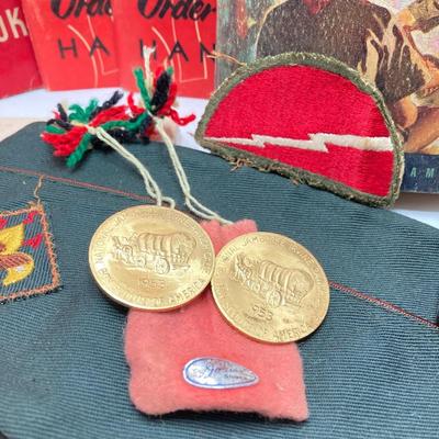 LOT 663: Boy Scouts Vintage Memorabilia - Jewelry / Pins, Hat, Token Coins, Order of the Arrow Books and More
