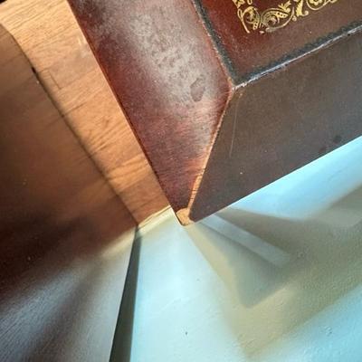 Sale Photo Thumbnail #113: Leather top nesting table set of two larger table 26” x 16” larger table has leather top smaller table has wood top