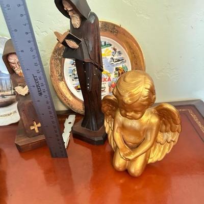 Sale Photo Thumbnail #131: Variety of home decor, including angels and decorative plates