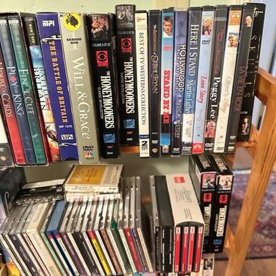Sale Photo Thumbnail #175: Media rack with a variety of VHS and DVDs 22 inches wide 47 inches tall

Rack needs to be tightened 