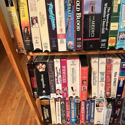 Sale Photo Thumbnail #170: Media rack with a variety of VHS and DVDs 22 inches wide 47 inches tall

Rack needs to be tightened 