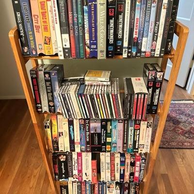 Sale Photo Thumbnail #172: Media rack with a variety of VHS and DVDs 22 inches wide 47 inches tall

Rack needs to be tightened 