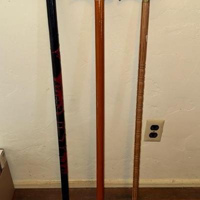 Sale Photo Thumbnail #232: Three wooden canes 