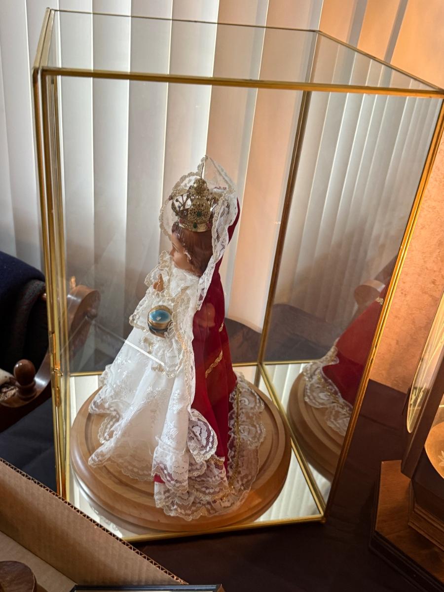 Religious themed Doll in mirrored back Display | EstateSales.org