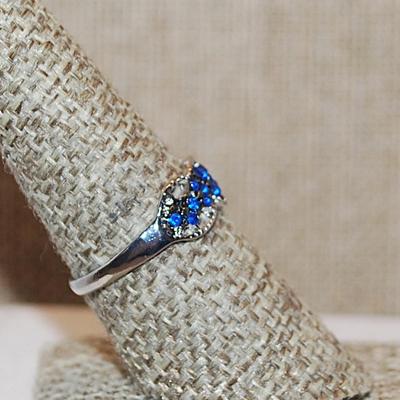 Size 8 Row of Cobalt BLUE Stones in a Swirl Setting on a Silver Tone Band (1.8g)