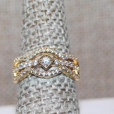 Size 6½ Gold "Diamond Setting" Ring for the Main Stone and 3 Rows of Clear Stones on a Gold Tone Band (3.2g)