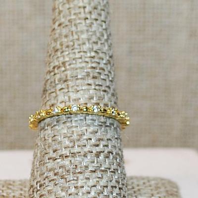 Size 6 Delicate All Infinity Styled Ring with Tiny Round Clear Stones Separated by Half Globe Accents on a Gold Tone Band (1.0g)