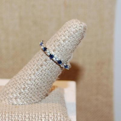 Size 6¼ Infinity Style Ring with Blue & Clear Alternating Stones on a Silver Tone Band (2.3g)
