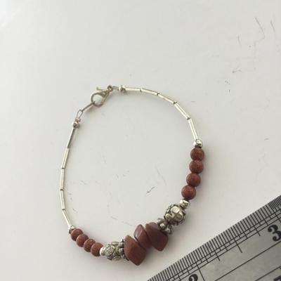 Silver tone brown beaded fashion bracelet