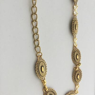 Gold tone adjustable belt