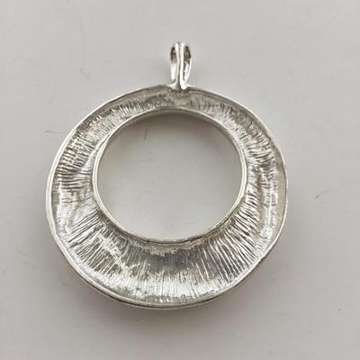 Silver tone necklace pendant