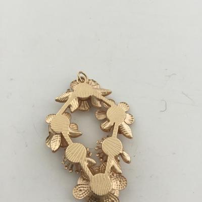 Gold tone flower necklace pendant