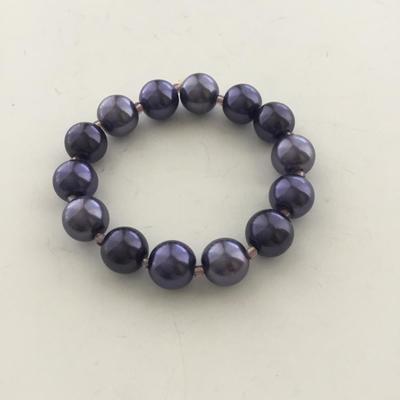 Purple beaded stretchy bracelet