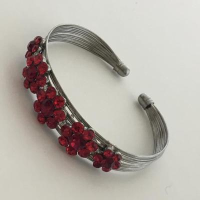 Silver tone red flower cuff bracelet