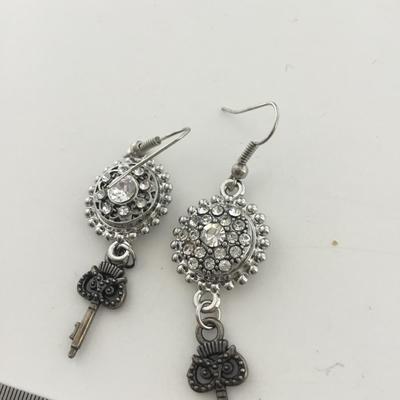 Silver tone dangle key earrings