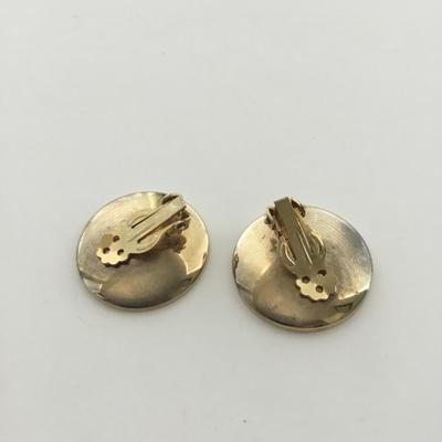Unmarked fuzzy feel round vintage clip on earrings