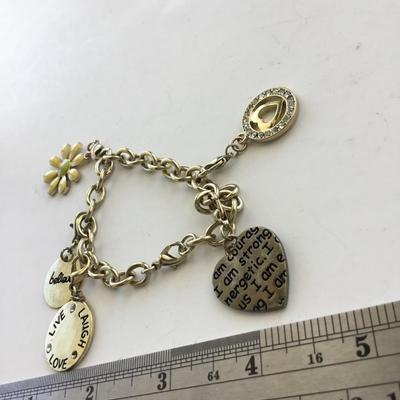 Beautiful gold tone charm bracelet