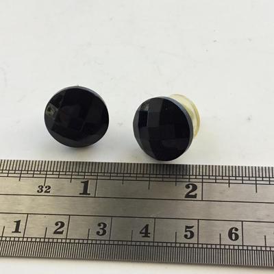 Unmarked black stud fashion earrings