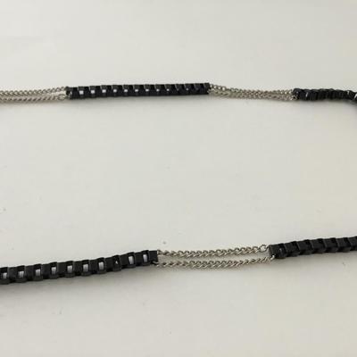 Black and silver tone long necklace