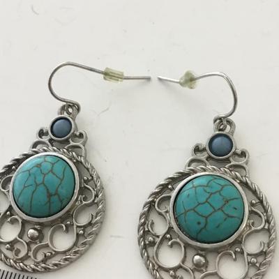 Silver tone fashion dangle earrings
