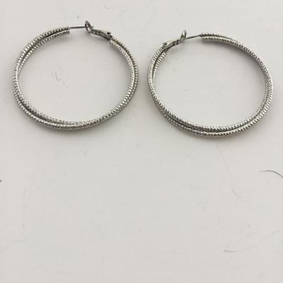 Silver tone hoop earrings