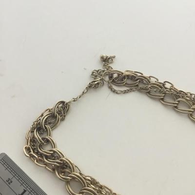 Gold tone multilayer fashion necklace