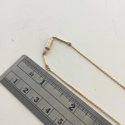 Gold tone unique clasp fashion necklace