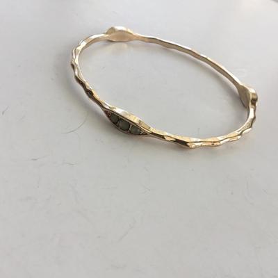 Gold tone green rhinestone fashion bracelet
