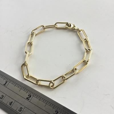 Gold tone chain type fashion bracelet